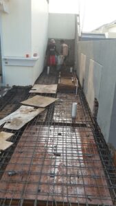 jasa renovasi rumah cluster greenwich pasang pondasi lantai